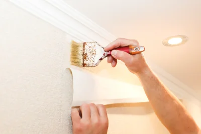 Pose de papier peint à Guénin — revêtements muraux et toiles de verre
